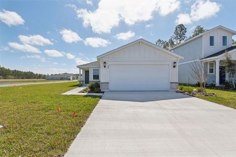Photo of 28 Sandy Lane, Palm Coast, FL 32137 (MLS # O6220892)