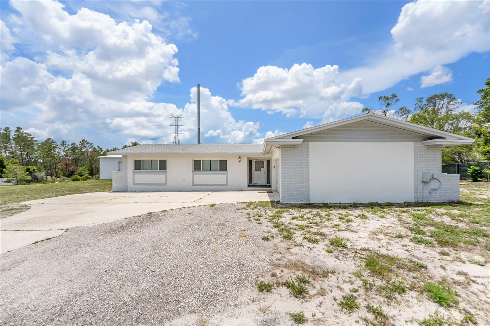 Welcome to this thoughtfully refreshed 3-bedroom, 2-bathroom home in the highly desirable East Lake area of Tarpon Springs. Nestled on a spacious lot with classic Old Florida charm, this home blends comfort, modern finishes, and everyday convenience
Step inside to discover a bright and open living space filled with natural light and neutral tones. The updated kitchen features sleek cabinetry, granite countertops, and stainless steel appliances—perfect for both daily living and entertaining. You'll also find a refreshed bathroom with an updated vanity, offering a clean and modern touch.
****Important Notes for Renters:
• The separate garage is NOT included with the rental.
• The driveway and yard are used periodically for event parking. Tenants will always have access to enter and exit the driveway and use the full attached garage; however, no personal items may be stored in the front yard.
• Tenants must be comfortable with sharing the driveway easement during events.
• In exchange for this arrangement, grounds care is included with the rent.****
Conveniently located near Lake Tarpon, top-rated schools, parks, shopping, and dining, this home offers an ideal Florida lifestyle in an established neighborhood.
No pets permitted.