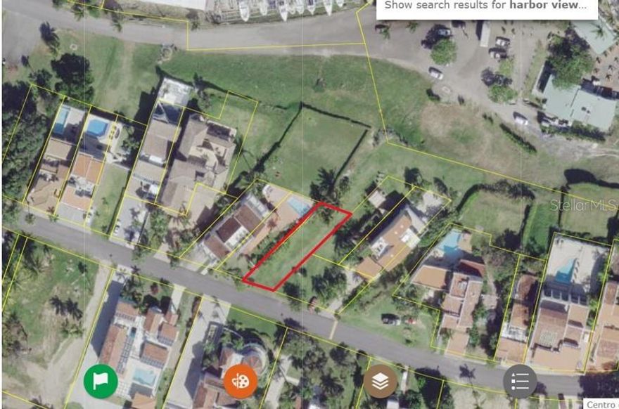 This is the perfect opportunity to build your custom home in the exclusive Harbour View community of Palmas del Mar. This premium 350 square meter lot offers 36 linear feet of frontage and breathtaking views of the Palmas del Mar Yachting Marina.
Located on a private street, this homesite offers stunning views of the marina and vibrant waterfront activity plus a short walk to world-class amenities, dining, and entertainment