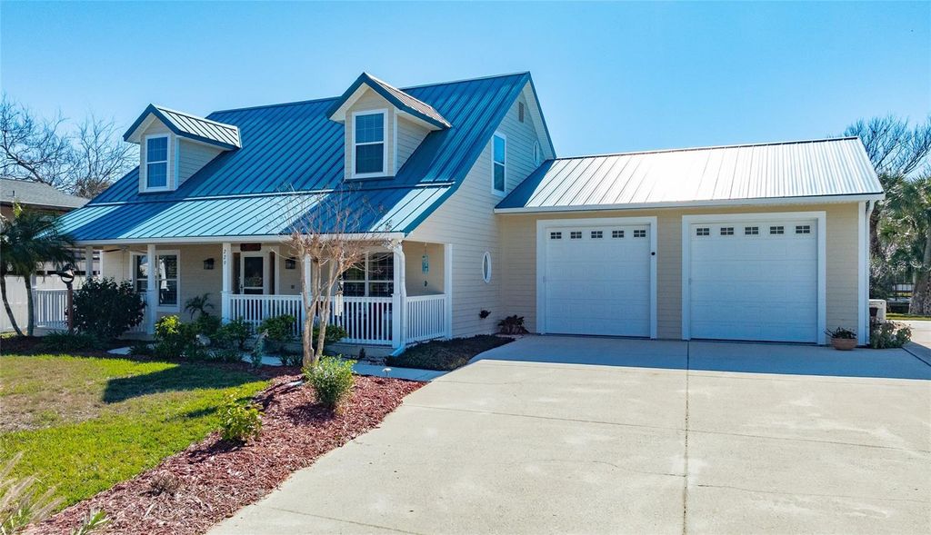 Photo of 229 Randle Avenue, Oak Hill, FL 32759 (MLS # NS1087193)