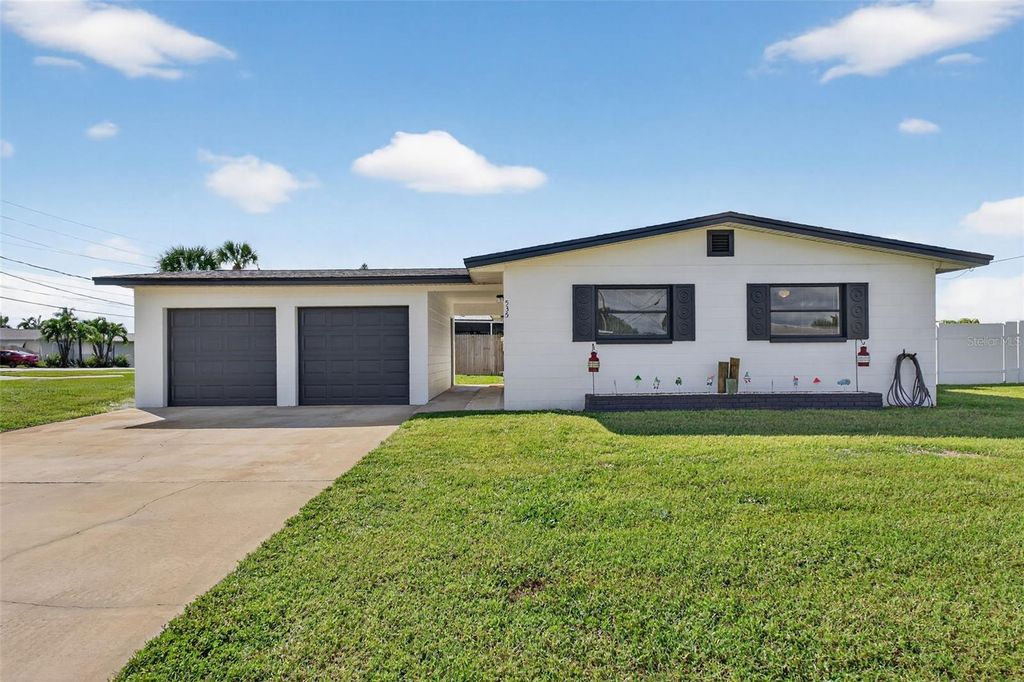 Photo of 535 Barrett Drive, Merritt Island, FL 32952 (MLS # O6352429)