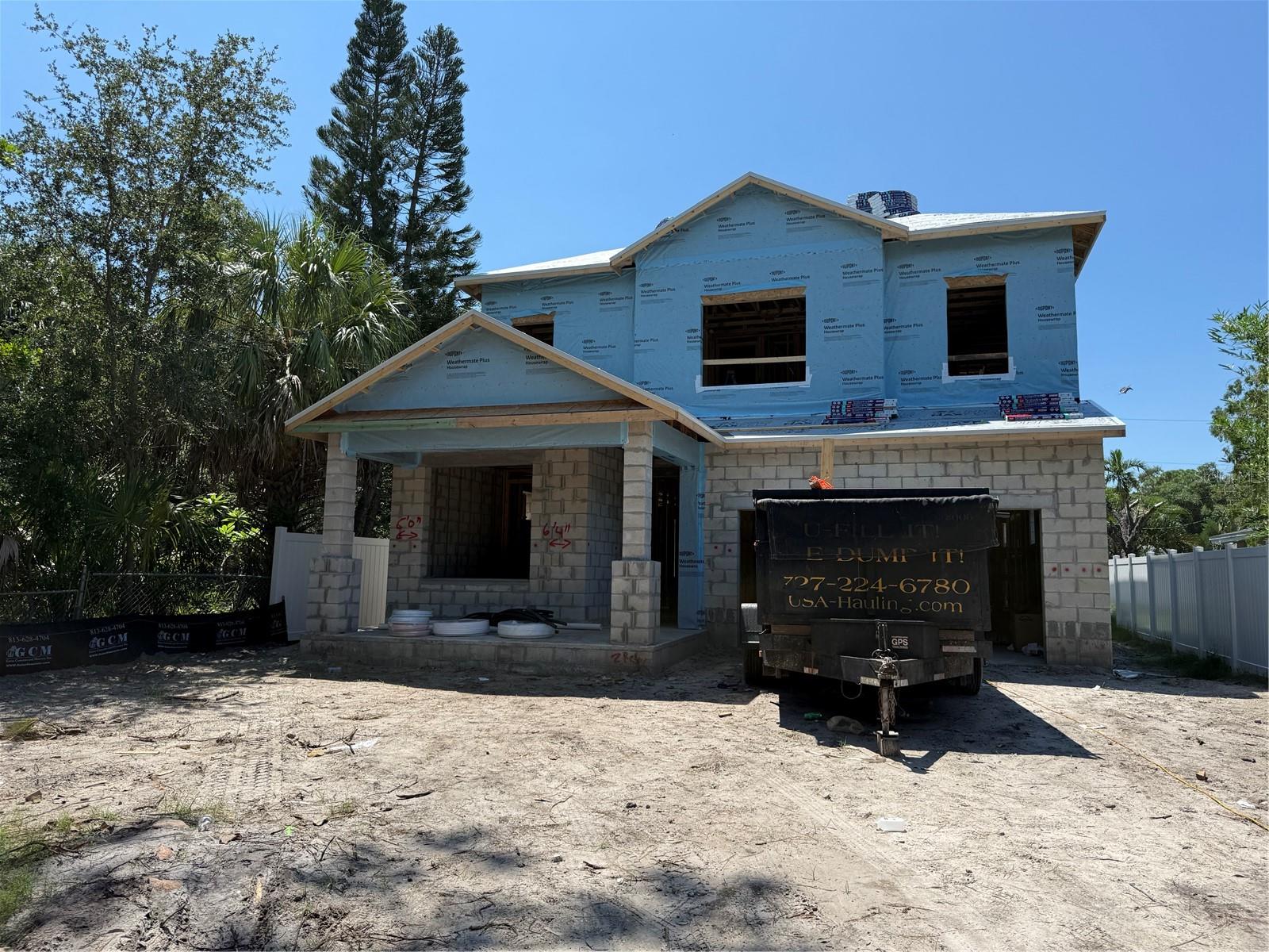 Under Construction. Start building new memories in this beautifully crafted, craftsman-style David Weekley Home located in the sought after neighborhood of Jungle Terrace in St. Petersburg, FL. From its welcoming curb appeal to the thoughtfully designed interior, this home offers both warmth and functionality in a modern open-concept layout. Step inside and experience a light-filled floor plan, where neutral tones—hand-selected by our professional design team—create a harmonious and inviting atmosphere throughout. The main level features a full bedroom and bathroom, perfect for guests or multi-generational living, along with a private study ideal for working from home or enjoying a quiet creative space. The kitchen is the true heart of the home, boasting a full-function island, ample cabinet space, expansive prep surfaces, and clear views of the connected dining and family areas. Whether you're enjoying everyday meals or hosting festive gatherings, this space is built to support connection and ease. With an in-house warranty team and an award-winning builder, you can rest easy on your new investment. Contact our knowledgeable customer service team today and schedule a tour.