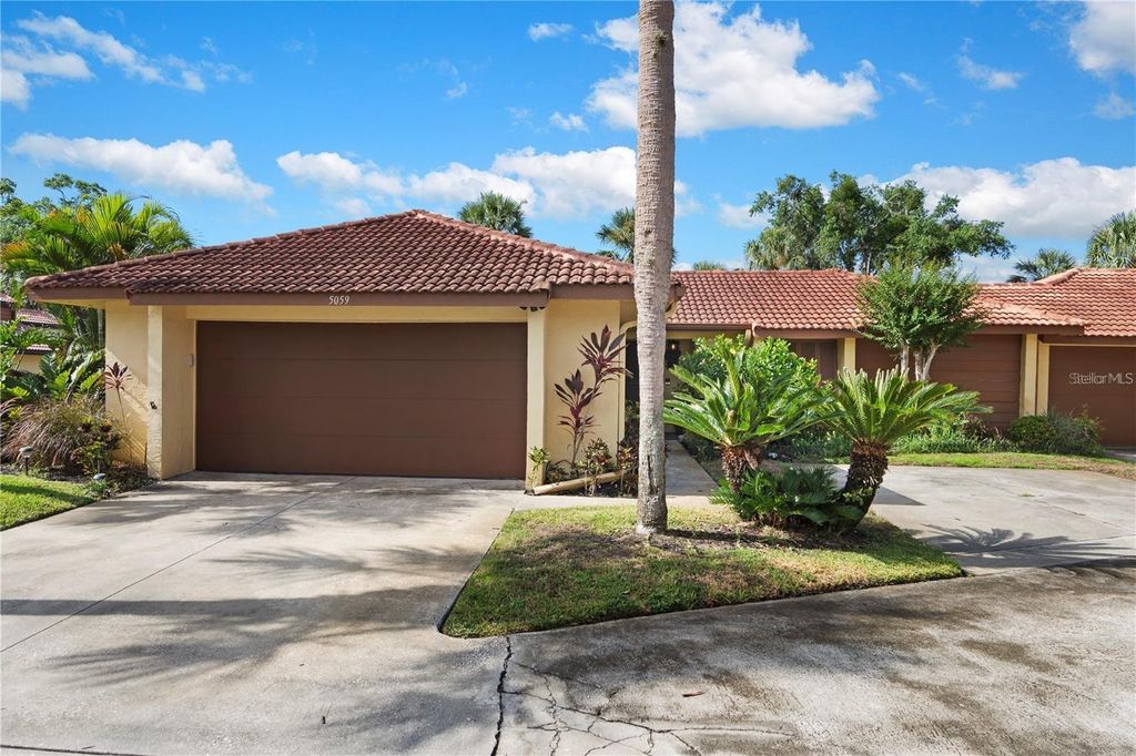 Photo of 5059 Jamaica Circle #15, Orlando, FL 32808 (MLS # O6372637)