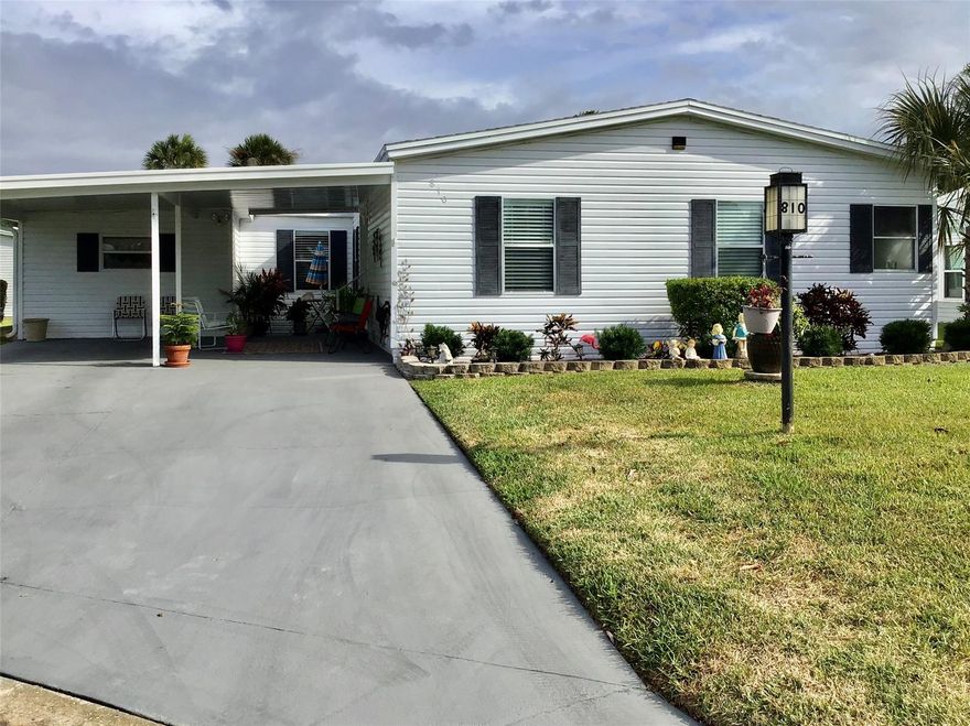 MAGNIFICO Triple Wide 3 bedroom split plan Palm Harbor with 2,746 total square feet.  Kitchen is a cook's delight (23'x13') with island cook top and loads of cabinets.  Large eat-in kithcen leads to porch all the way across the back.  Arched separate dining room.  Room in front for umbrella and chairs. Family and Living Room. Shed.  Covered carport -- room for lots of vehicles.  A/C 1/17/2020 with extended warranty, Roof 11/6/18 Owens-Corning Durations and new hurricane approved 22x30 glass skylight, termite bond, new sprinkler system.  Refrigerator, washer and dryer only a year old.  Easy walk to the resident boat ramp and intracoastal observation deck.  Edgewater offers SO many activities and amenities.  Including a few are fitness center, heated pool, screened hot tub, tennis, bocci, pickleball, fishing pier, entertainment committee, and the list goes on and on.  Outside storage for one toy- either a boat, RV or kayat when available. ;Water: City