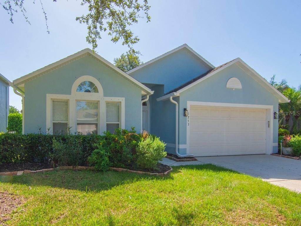 Welcome to easy living in this beautifully maintained single-level 3-bedroom, 2-bathroom home located in a desirable gated Majestic Oaks community just minutes from downtown Vero Beach. With a bright, open-concept layout and vaulted ceilings, this home offers a spacious and airy feel throughout. Enjoy peaceful mornings or evening sunsets from the covered lanai, which overlooks a tranquil neighborhood pond—a perfect setting for relaxation or entertaining guests. The functional layout includes a 2-car garage, spacious bedrooms, and a well-appointed kitchen that flows seamlessly into the living and dining areas. Natural light fills the space, highlighting the home’s inviting character and charm. Residents of this vibrant community enjoy access to fantastic amenities including a community pool, basketball court, and playground. All of this is conveniently located close to parks, fitness centers, shopping, dining, and the best of Vero Beach. This move-in-ready gem combines comfort, convenience, and a prime location. Schedule your showing today!