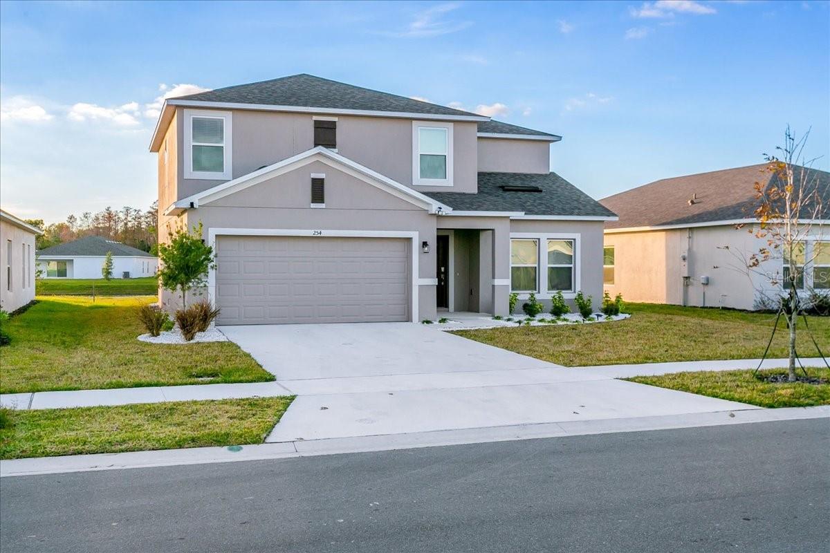 Welcome to 254 Amber Way, a stunning 5-bedroom, 3-bathroom Azalea model by Taylor Morrison in the desirable Stepping Stone community of Poinciana. Offering 2,287 square feet of thoughtfully designed living space, this home features an open-concept layout with a spacious kitchen, walk-in pantry, generous great room, and a private downstairs guest suite. Upstairs you’ll find the oversized primary suite with dual vanities, a large walk-in closet, and three additional bedrooms surrounding a central loft.
Stepping Stone is a peaceful, family-friendly neighborhood with scenic walking trails, a community pond, and playgrounds. Just minutes away, residents enjoy access to the brand-new Poinciana Lakes Plaza, Publix, medical centers, restaurants, retail shops, and more — making everyday convenience a true luxury. With easy access to Cypress Parkway, Marigold Avenue, and major routes to Kissimmee, Orlando, and Disney, this location combines suburban tranquility with excellent connectivity. Don’t miss this opportunity to live in a quality-built home in one of Poinciana’s fastest-growing areas!