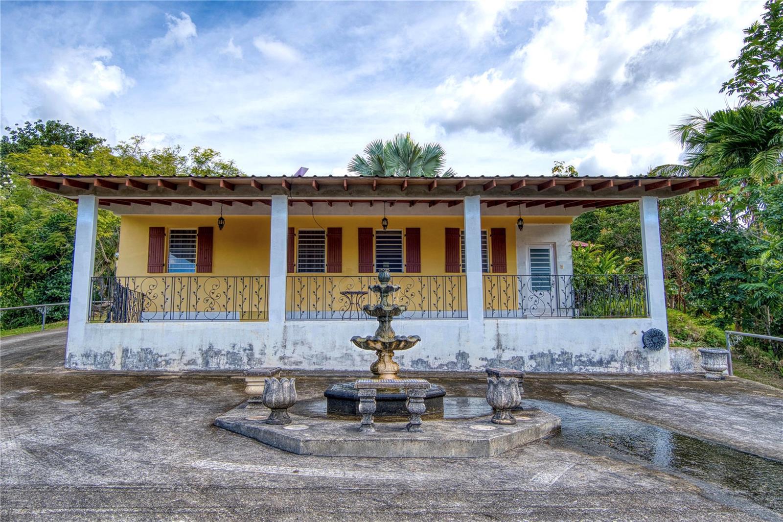 Discover your piece of paradise in Maricao, Puerto Rico! Botanical gardens, this haven with 600+ plant varieties, 10 to 20 feet wide cleared trails, panoramic views of Maricao State Forest, mountains, springs, and river. Immerse yourself in stunning flowers and indulge in delicious fruits as you explore endless possibilities – from crafting your dream home to embracing eco-tourism, horse riding, ATV adventures, mountain biking and serene camping or glamping. Ample space for helipad. 30,000-gallon springwater tanks and three homes, this property offers the perfect blend of luxury and nature. Property is segregated in 3 individual parcels all sold together. 3 Properties and 55 acres of paradise.