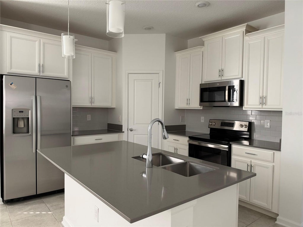 Photo of 1362 Viscaya Cove Boulevard, Winter Garden, FL 34787 (MLS # O6452135)