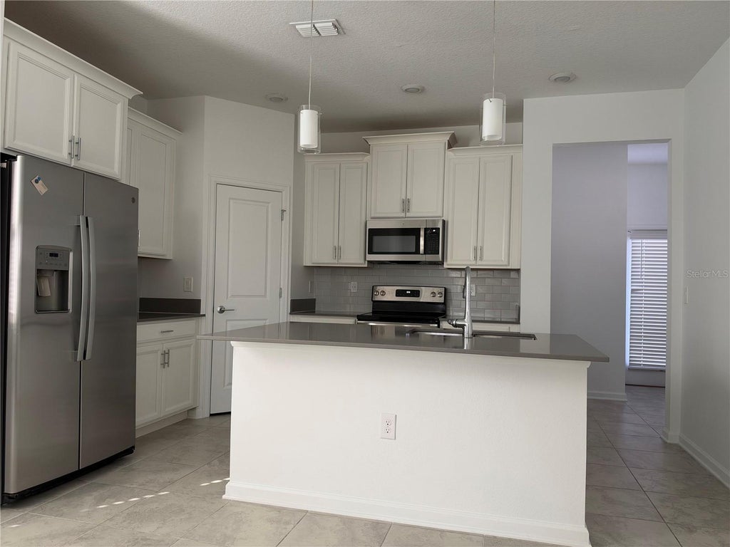 Photo of 1362 Viscaya Cove Boulevard, Winter Garden, FL 34787 (MLS # O6452135)
