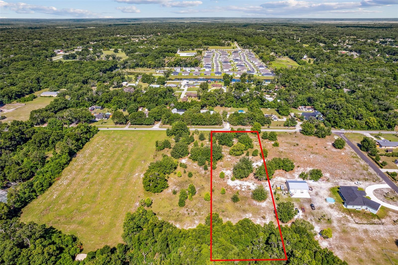 ***NEW PRICE ***COUNTRY LIVING WITHIN CITY LIMITS! Conveniently located 2.39 acres, CLEARED and READY for your DREAM HOME with NO HOA! Location is everything with this property, two minutes from Deland's main hospital (Advent Health) and the many health facilities. Five minutes from award winning DOWNTOWN DELAND for Fine and Casual Dinning, Shopping, Festivals, Farmer's Market, Concerts, Athens Theatre for Plays/Shows, Coffee Shops, Museums, Annual Craft Show and many more. Seven minutes from Deleon Spring State Park for Swimming, Fishing, Boating, Picnic and other outdoor activities. ALL the conveniences close by with peace and tranquil of COUNTRY LIFE. The property has City Water and Electric connection available. Septic is required.