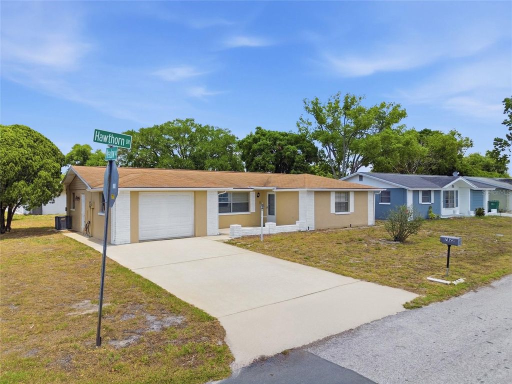 Photo of 7825 Hawthorn Drive, Port Richey, FL 34668 (MLS # TB8505859)