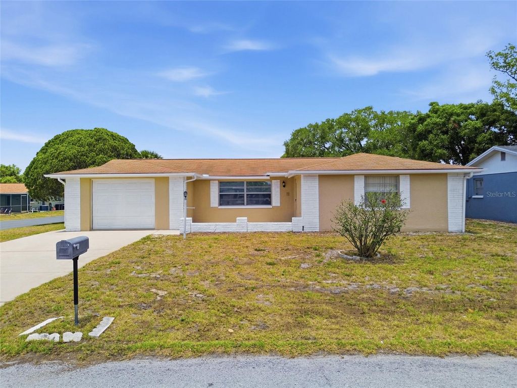 Photo of 7825 Hawthorn Drive, Port Richey, FL 34668 (MLS # TB8505859)