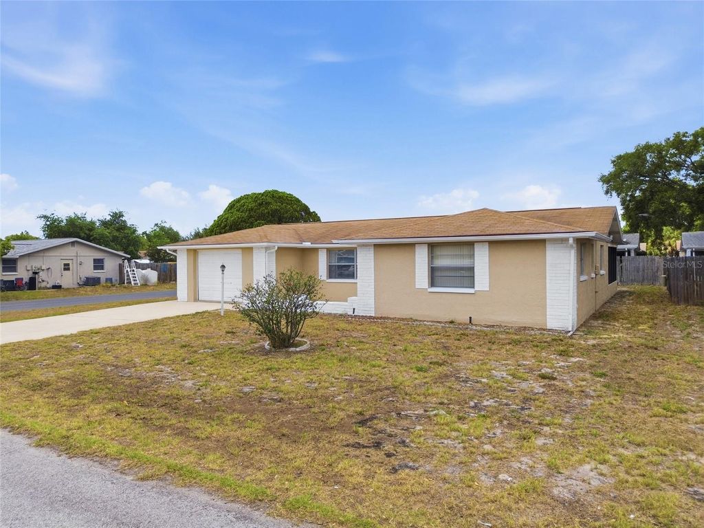 Photo of 7825 Hawthorn Drive, Port Richey, FL 34668 (MLS # TB8505859)