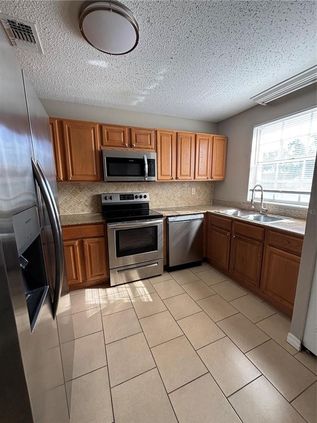 Photo of 404 Banyon Tree Circle #200, Maitland, FL 32751 (MLS # O6365226)