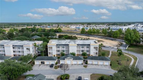 7509 MOURNING DOVE CIRCLE 303 REUNION FL 34747