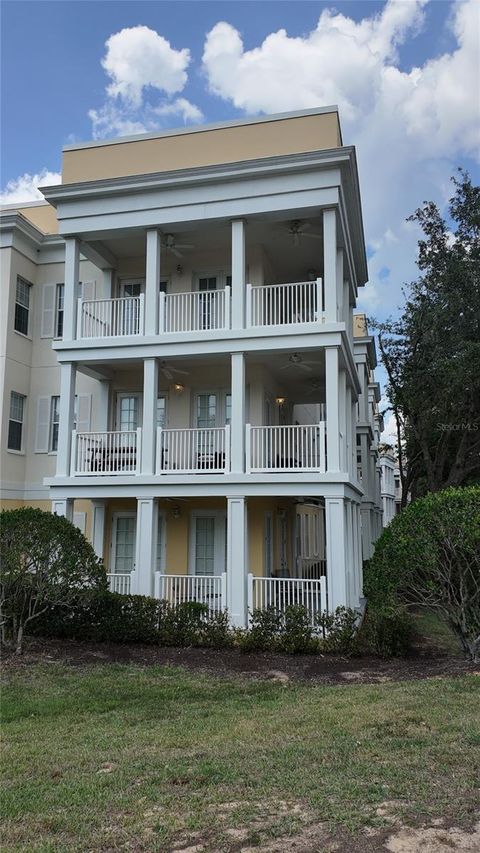 7509 MOURNING DOVE CIRCLE 303 REUNION FL 34747