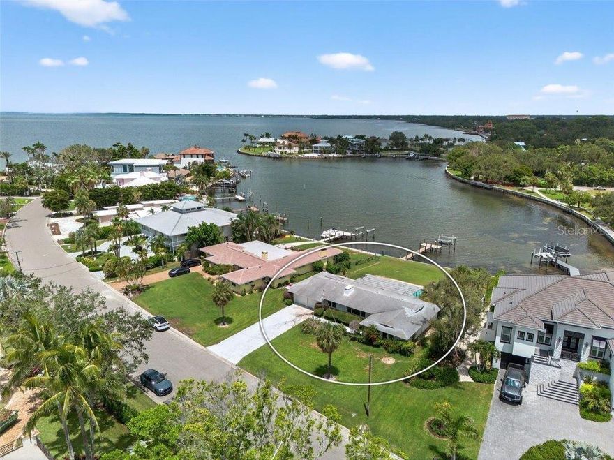 Amazing opportunity to create your waterfront estate in Sapphire Shores, where history, culture, and growth meet. This 16,378 sq. ft. lot offers 87 feet of water frontage, a private dock, and direct access to Sarasota Bay. Positioned along a quiet shoreline, it overlooks an almost 900-foot-wide deep-water basin, providing both privacy and natural beauty. Sapphire Shores combines legacy estates, striking new builds, and proximity to cultural landmarks such as The Ringling Museum and Asolo Theatre.With the North Trails ongoing transformation, including new developments, zoning updates, Ringling Colleges expansion the neighborhood is emerging as a prime location for luxury residences.  Whether for a custom estate or a speculative project, this is a rare chance to secure a large waterfront property in one of Sarasota's most dynamic luxury neighborhoods.