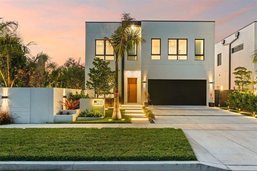 Vacation home in paradise? Potential income earner? House located in an A-rated school district?
Yes, yes, and yes! This custom-built by Siesta Kay Properties modern residence showcases unmatched craftsmanship and attention to detail. Moments from Siesta Key and Southside Village with Morton’s Gourmet Market, boutique shops, and top-rated restaurants.
Situated outside the flood zone, this home offers peace of mind along with resort-style living. Featuring 4 bedrooms plus office, 6 baths, an elevator, and a stunning saltwater pool and spa with a waterfall feature, this property is designed for both comfort and entertainment.
The outdoor living space is a private oasis with a caged lanai, outdoor kitchen, pool bath, and a lush tropical garden filled with oaks, magnolias, olive trees, and a variety of palms — royal, areca, traveler’s, and foxtail.

Inside, enjoy 10-foot ceilings on both floors, solid masonry walls, large-format porcelain tile, and custom cabinetry throughout. The floating white oak staircase, which illuminates as you approach, is a true showpiece. Upstairs, the engineered hardwood floors add warmth and sophistication. Each of the four en-suite bedrooms provides comfort and privacy. The primary suite offers space for a king-size bed, a walk-in closet, and a spa-inspired bathroom where you can unwind in the freestanding tub or take in the sunset from the expansive balcony.
  The chef’s kitchen features islands with double waterfall edges, ample cabinetry, a pantry, and top-of-the-line Bosch appliances including a freestanding commercial-grade range. Premium finishes include Kohler, Grohe, and Hansgrohe fixtures, LED mirrors and lighting, and Level 5 drywall finish for a sleek, modern aesthetic. Additional highlights:
2 A/C systems;PGT hurricane-rated, sound and heat-insulated windows and doors; Surround sound system on the main floor,2-car garage with epoxy floors,Concrete driveway,LED outdoor lights, Irrigation system, concrete fence. 
This home perfectly blends modern elegance and functionality, offering a lifestyle that’s both luxurious and convenient — a true must-see!
Schedule your private showing today!