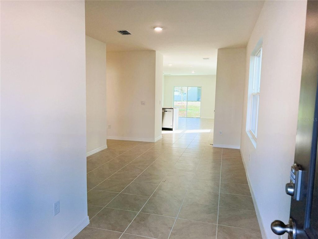 Photo of 2127 Desert Rose Drive, Davenport, FL 33837 (MLS # S5152026)