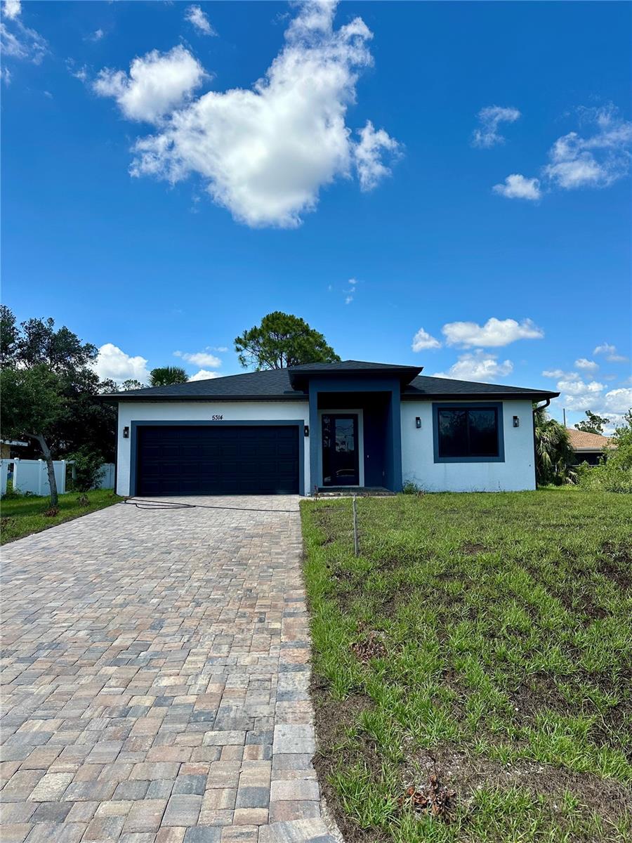 Welcome to your dream home in North Port, Florida! This brand-new, move-in ready home features 3 bedrooms, 2 bathrooms, a versatile den or office, and a 2-car garage. Enjoy a bright, open floor plan with soaring ceilings, luxury vinyl plank flooring, and a chef-worthy kitchen with quartz countertops, stainless steel appliances, a large island, and walk-in pantry. The spacious primary suite offers a walk-in closet and spa-like bathroom with dual vanities and a glass-enclosed shower. Two additional bedrooms provide space for family or guests. Step outside to a private backyard perfect for relaxing. Located in a thriving community near top-rated schools, shopping, dining, parks, and just a short drive to Gulf Coast beaches like Siesta Key and Venice Beach. With easy access to I-75, Sarasota and Fort Myers are within reach. Schedule your private tour today—this stunning home won’t last!