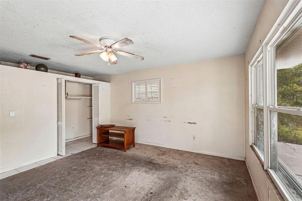 Photo of 838 Cordele Avenue NW, Port Charlotte, FL 33948 (MLS # TB8500353)