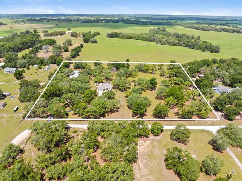 Photo of 19509 Paso Fino Way, Dade City, FL 33523 (MLS # W7886224)