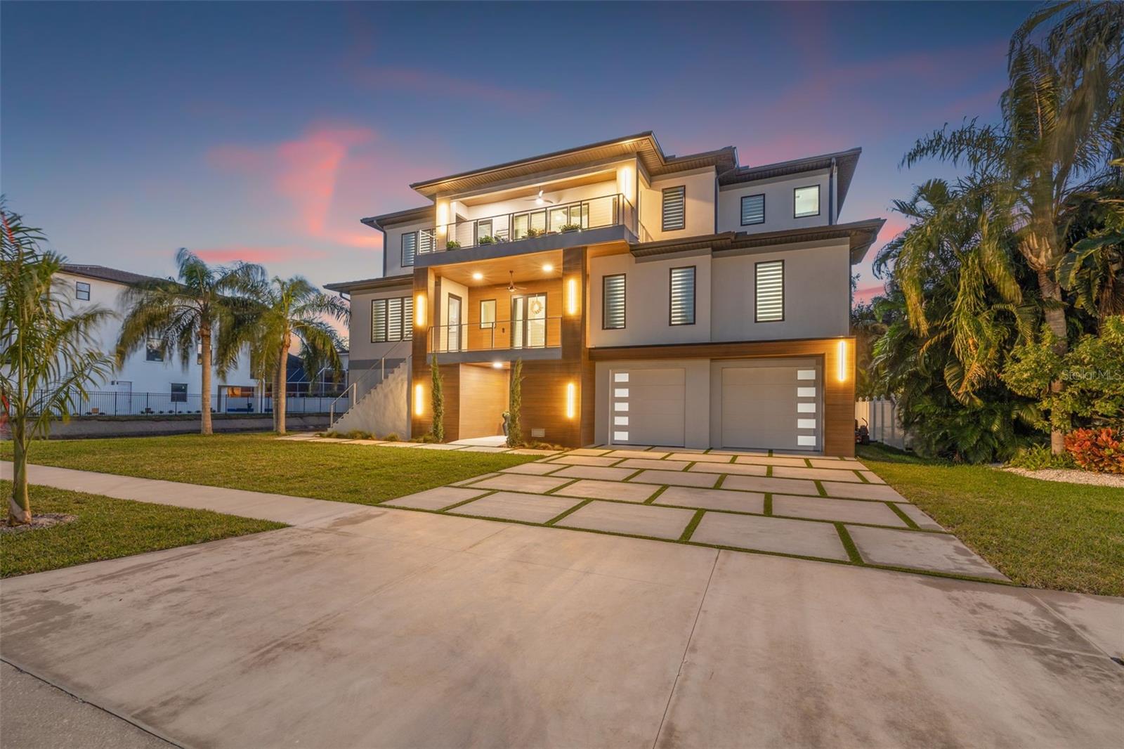 Under Construction. UNDER CONSTRUCTION – ESTIMATED COMPLETION: JULY 2025
Located within the gates of the iconic PASADENA YACHT & GOLF CLUB, this new estate by KELNER HOMES offers a rare opportunity to own in one of Florida’s most storied waterfront communities. This nationally recognized club—where legends like MICHAEL JORDAN, BABE RUTH, and ARNOLD PALMER have played—offers the perfect blend of WORLD-CLASS GOLF and DIRECT MARINA ACCESS. Here, luxury means more than design—it’s about lifestyle, convenience, and history.
This MODERN, ARCHITECTURALLY CLEAN home will span over 4,000 SQ FT, built for both everyday living and effortless entertaining. On the first level, you'll find a spacious 4-CAR GARAGE, PRIVATE ELEVATOR, and ample storage. The main floor brings together a beautifully designed KITCHEN AND LIVING AREA, complete with high-end ZLINE APPLIANCES and WIDE-PLANK WOOD FLOORING. The PRIMARY SUITE offers both privacy and function, thoughtfully tucked away for quiet and ease. Upstairs, a spacious GAME ROOM anchors three additional bedrooms—ideal for FAMILY, GUESTS, or MULTI-GENERATIONAL LIVING.
This home is more than just new construction—it's your entry into a TURNKEY LUXURY LIFESTYLE. Enjoy priority access to the club with a GOLF MEMBERSHIP AVAILABLE IN JUST 30 DAYS. Secure your spot on the water with BOAT SLIPS FOR PURCHASE OR LEASE. Host memorable gatherings at the club’s EXECUTIVE-CHEF RESTAURANTS, and enjoy the peace of mind that comes with 24/7 GATED SECURITY.
Kelner Homes continues to redefine modern coastal living with homes that are distinct, design-driven, and tailored for those who expect more. If you’re ready for something that truly stands apart, this is worth seeing in person.