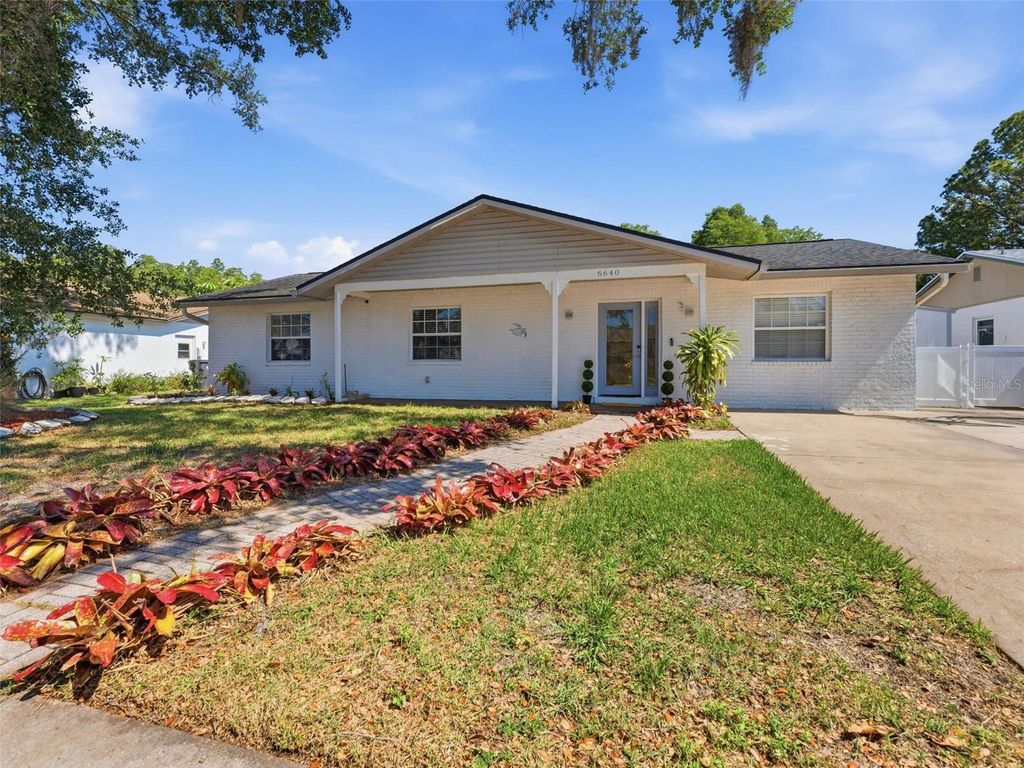 Photo of 6640 Winding Oak Drive, Tampa, FL 33625 (MLS # TB8509174)