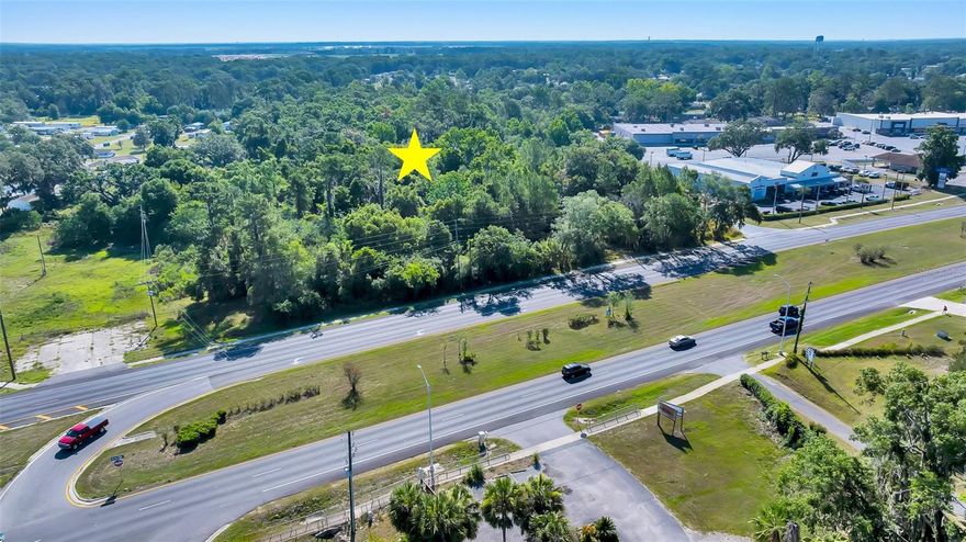PRIME COMMERCIAL MXED USE HIGHWAY 441 FRONTAGE-Commercial Mixed Multi use zoning and engineering see attached conceptual plans Commercial frontage with 60 unit apartment or Town house approval 7.95 acres 450 feet of frontage on 441 in Belleview between K-mart Plaza and Ace Hardware. Perfect location for a restaurant or chain store on high traffic count highway. Water and sewer already built to location. FDOT curb cut approved and some engineering complete