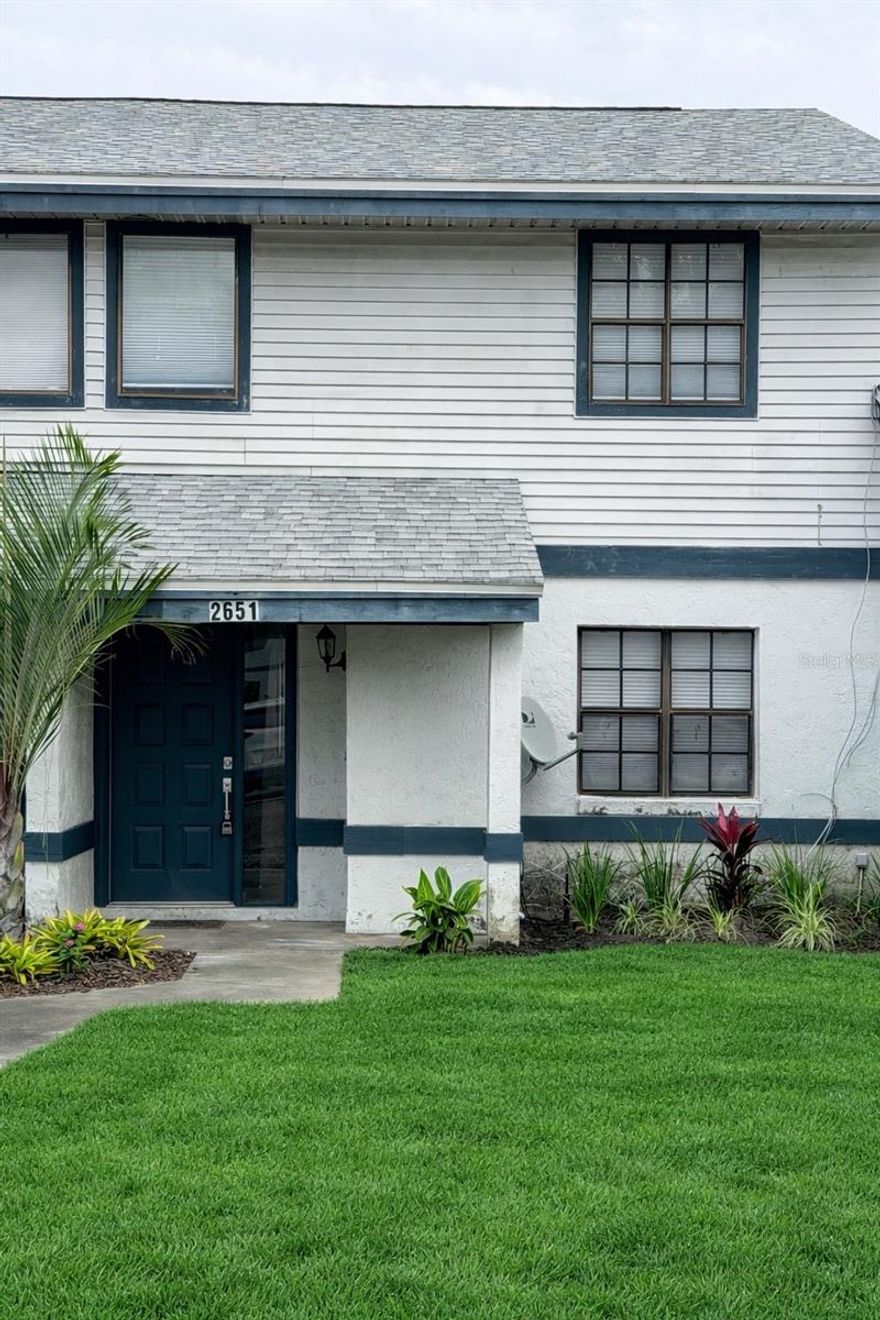 Welcome to this beautifully renovated 2-bedroom, 2-bathroom townhome located in the highly desirable East Orlando / UCF area. This move-in-ready home offers a modern feel with thoughtful updates throughout, including new flooring, a fully updated kitchen, and stainless steel appliances. The open and functional layout provides comfortable living spaces, spacious bedrooms, and updated bathrooms designed for everyday convenience. The renovated kitchen is perfect for cooking and entertaining, featuring contemporary finishes and ample storage. Ideally situated just minutes from UCF, major highways, shopping centers, dining, and everyday conveniences, this location offers easy access to everything East Orlando has to offer while maintaining a neighborhood feel. This is a great opportunity to enjoy a renovated home in a prime location. Schedule your showing today. (septic tank recently replaced, new sod will be installed once approval from HOA.)