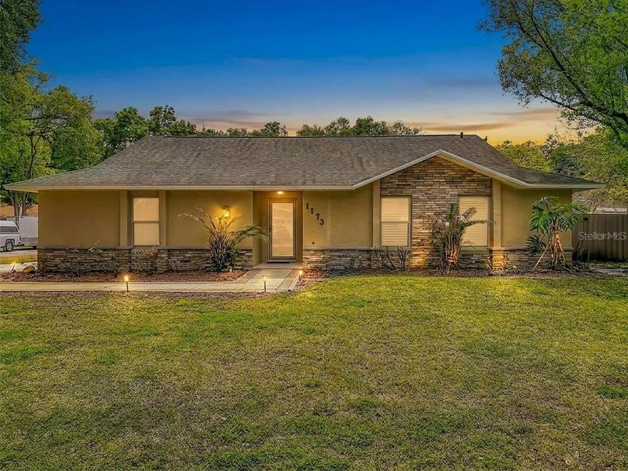 Beautifully Remodeled 3 bedroom 2 Bath home offering a stylish living space in Sanford, just minutes from the airport.Situated on a desirable corner lot, this home features Luxury vinyl plank flooring throughout and a spacious, updated kitchen perfect for entertaining.There is a lot of counter space for baking & cooking.The Primary retreat is large & has a walk in closet & updated bathroom with shower. Bedroom 1 includes a convenient Murphy bed, Maximizing space and functionality.The home is finished with elegant 5.14 Baseboards, adding a refined touch throughout, including plantation shutters in all rooms.Enjoy the outdoors in the large fully fenced yard complete with a new well. Additional upgrades include new ceiling fans in all bedrooms. All ceilings flat- no popcorn. Located in a quiet area, This property offers both comfort & convenience-ideal for anyone seeking a move in ready home. NO HOA, New Roof in 2018, Hot water Heater 2015,HVAC 2023 Washer- Dryer 
stays including kitchen appliances. There is a large screened in porch in back with a paver patio for grilling.Newer windows,too.Some photos are staged. Welcome Home!