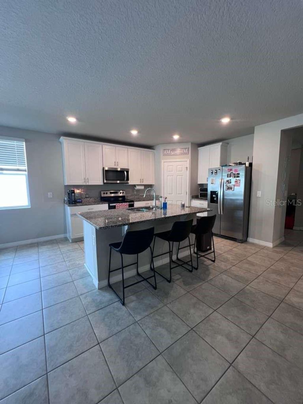 Photo of 560 Jerry Ln, Haines City, FL 33844 (MLS # O6404218)