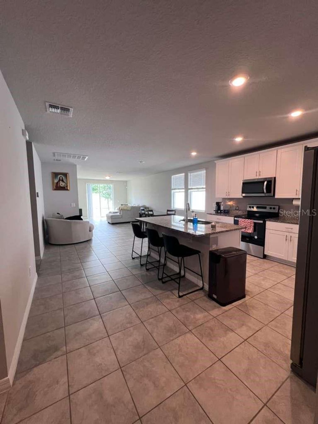 Photo of 560 Jerry Ln, Haines City, FL 33844 (MLS # O6404218)