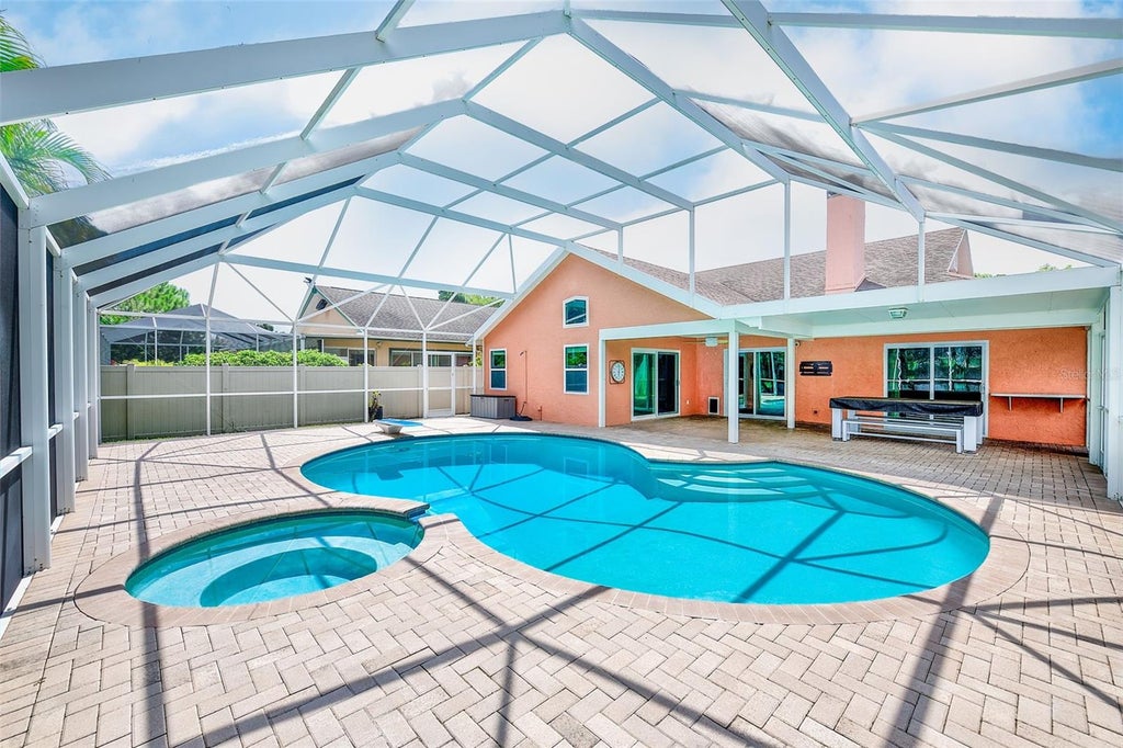Photo of 3106 Featherwood Court, Clearwater, FL 33759 (MLS # TB8542271)