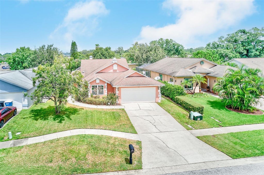 Photo of 3106 Featherwood Court, Clearwater, FL 33759 (MLS # TB8542271)