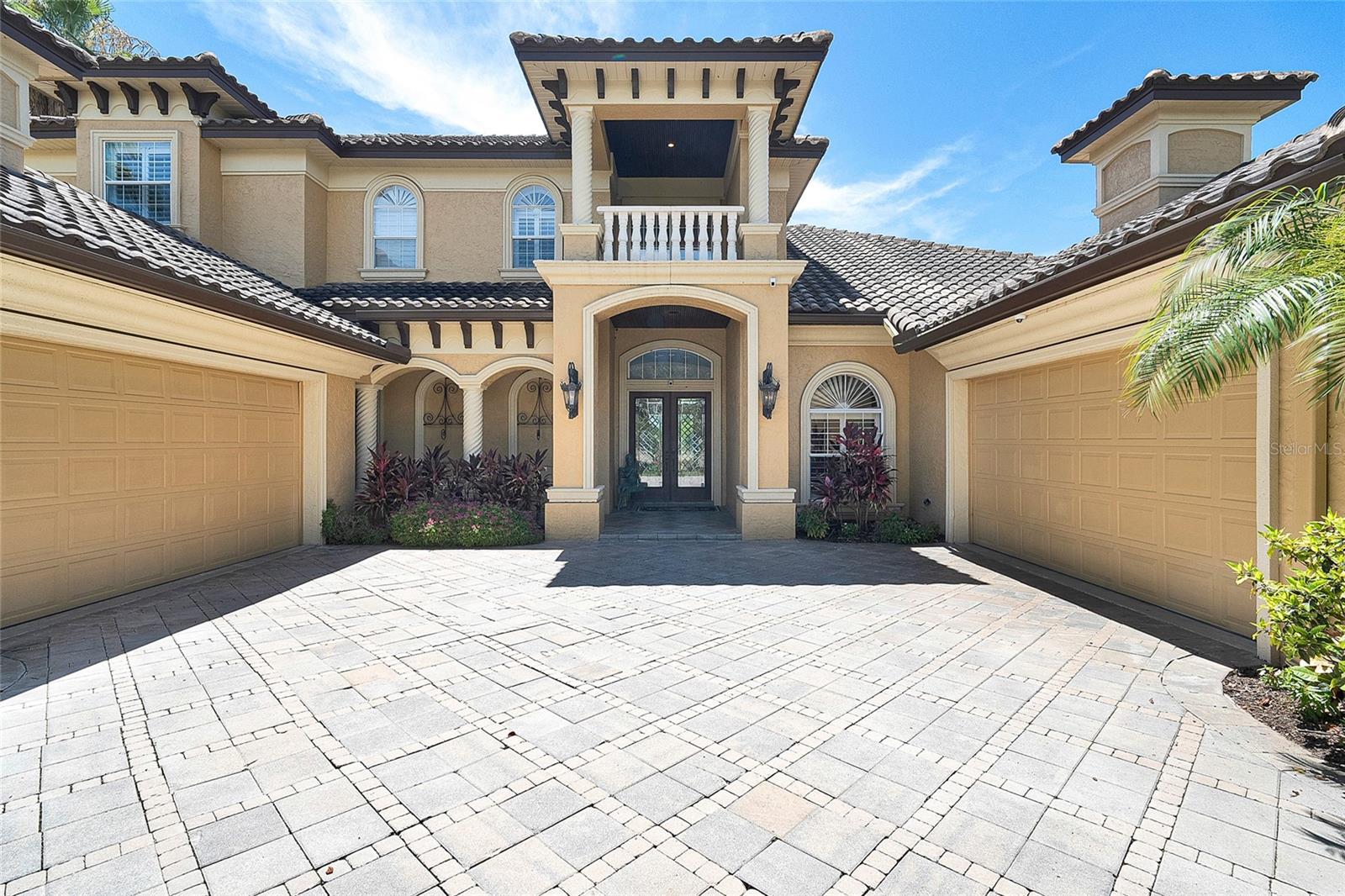 Welcome to this magnificent 2003-built executive home, perfectly positioned at the end of an exclusive cul-de-sac in the prestigious gated community of Bayou Club Estates. This private enclave offers 24-hour security, ensuring peace of mind in one of Pinellas County’s most sought-after locations.
Situated on over half an acre with an impressive 163 feet of waterfront along the Bayou Waterway, this home offers direct access to the Gulf of Mexico—a rare find in this area and ideal for boating enthusiasts.
Enjoy breathtaking, unobstructed 180-degree water views throughout this elegantly designed 5,000+ sq ft residence, featuring 5 spacious bedroom suites, 5 bathrooms, a large executive office, formal living and dining rooms, and an oversized family room with fireplace that opens into a stunning designer kitchen.
The second floor includes a versatile loft space with a family room and kitchenette, plus a dedicated flex room currently outfitted as a private movie theater, complete with a projector and screen—perfect for entertaining or relaxing with family.
A four-car garage provides generous space for vehicles and storage. Outdoors, enjoy a resort-style heated pool and spa, and a private dock with room for a small boat or jet skis—just 10 minutes to John’s Pass and open Gulf waters.
With access to the award-winning Tom Fazio-designed Bayou Club golf course, abundant wildlife including manatees right off your dock, and a central location just minutes from beaches, downtown St. Petersburg, Clearwater, and Tampa International Airport—this home offers the best of Florida luxury living.