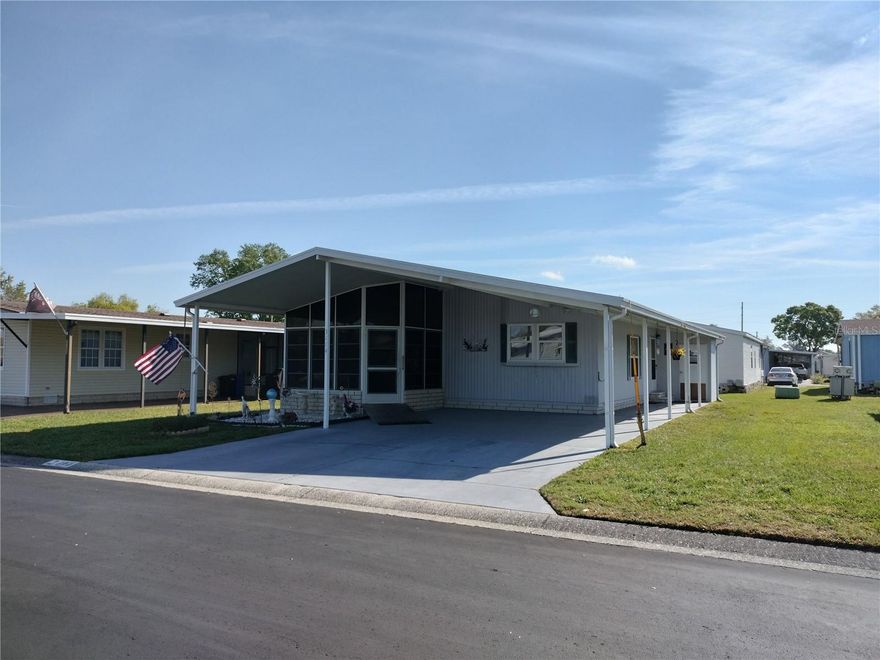 Welcome to Timber Lake Estates, an all aged community! This wonderful 2 bedroom 2 Bath furnished home is waiting for you. This home features double parking and storage shed, a front Florida room with windows and French doors that enter into the large living room. The Master suite with walk-in closet also has French doors that lead into the master bathroom. Walking distance to the clubhouse and pool. NEW A/C in 2024.This home is in a great location with easy access to Wesley Chapel and Zephyrhills. All this and located in a very desirable all aged well kept family oriented community with tons of activities and great amenities some of which include 2 pools, 2 clubhouses, Shuffleboard and Basketball courts, fishing lake with dock and YOU OWN THE LAND.