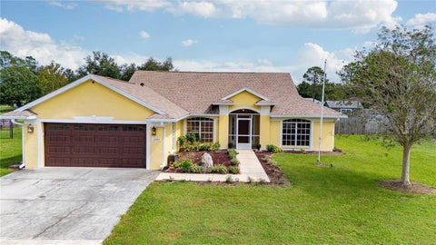 Photo of 12404 Palm Ridge Drive, San Antonio, FL 33576 (MLS # TB8561078)