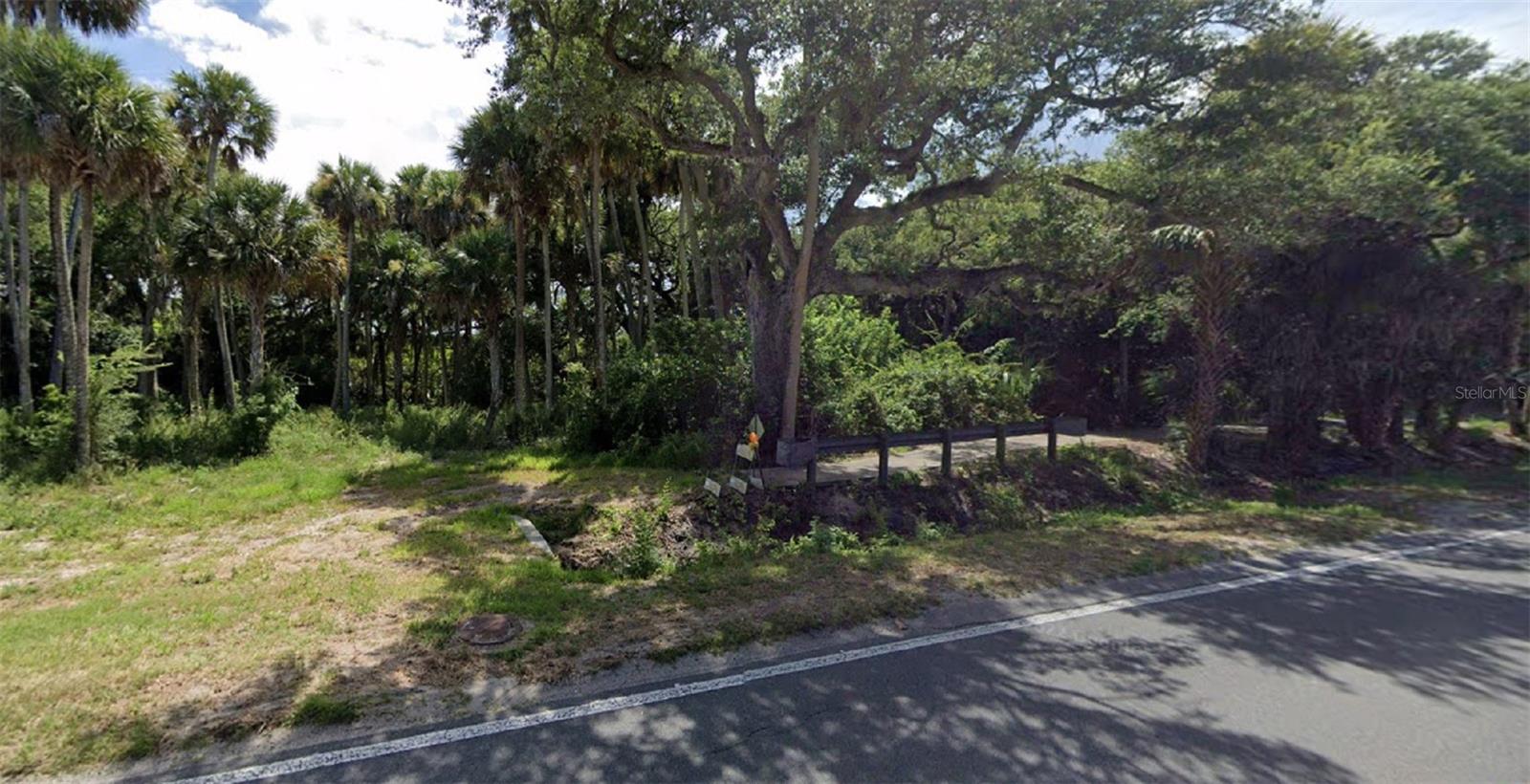 Exceptional opportunity to customize your dream property! This prime location is a key factor, and for the discerning buyer, this vacant land presents numerous possibilities. Situated on a lush .55-acre parcel, this property is not only central to the charming offerings of our beach town – including shopping, dining, events on Flagler, and the farmers market off Canal – but it also boasts proximity, less than a mile, to the glistening sands of the Atlantic Ocean. Additionally, this unique parcel is nestled along a beautiful estuary, surrounded by local vegetation and teeming with wildlife. The enchanting estuary not only enhances the natural beauty of the land but also provides an abundance of privacy. Acquire this piece of paradise today and embark on building your dreams for tomorrow.