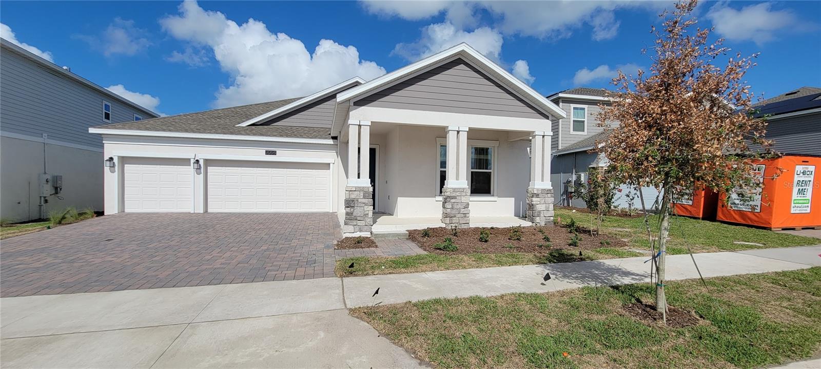 Live in a Waterfront, master planned boating community, with resort-style swimming pool, pockets of green space, playground and sports courts available for residential use. At the heart of the community is a gorgeous pond for waterfront views and activities. The pond at the backyard connects to other 5 chain of lakes through canal. With planned fitness center, tot lot and private boat launch on the way BridgeWalk is the place to live. The home boasts an open plan with the family room and kitchen with the quartz counters and stainless-steel appliances overlook the waterfront view of the pond. Large Owner's Suite with trey ceilings is connected to laundry room and adjoining bedroom. The other bedrooms share a jack and jill bathroom. With a 3 car garage and a covered patio in the back and covered porch in the front of the home there is more than enough space for everyone in the family to enjoy. It's only a ten minute drive to Lake Nona Medical City. Close to highway 417 and MCO airport as well. Call now.