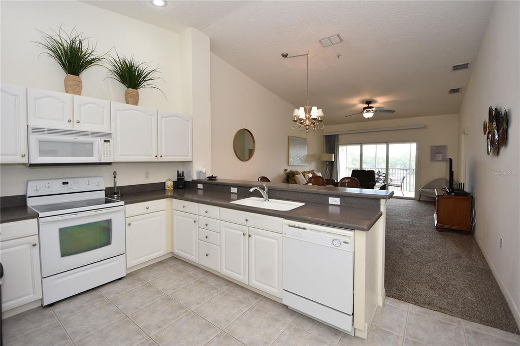 Photo of 400 Canopy Walk Lane #444, Palm Coast, FL 32137 (MLS # FC317653)