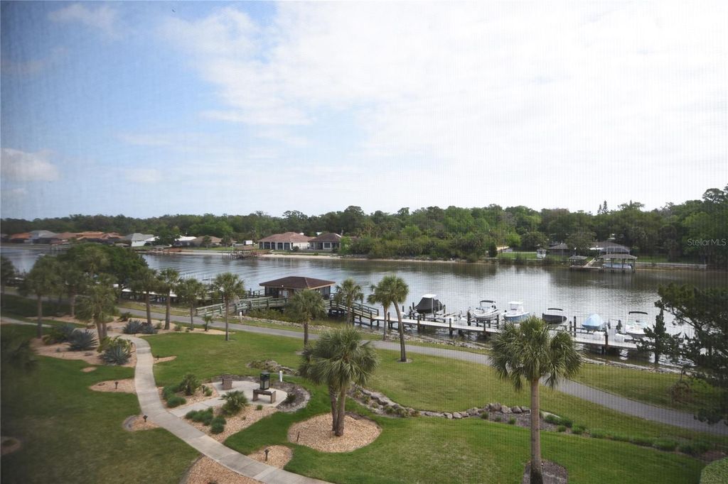 Photo of 400 Canopy Walk Lane #444, Palm Coast, FL 32137 (MLS # FC317653)