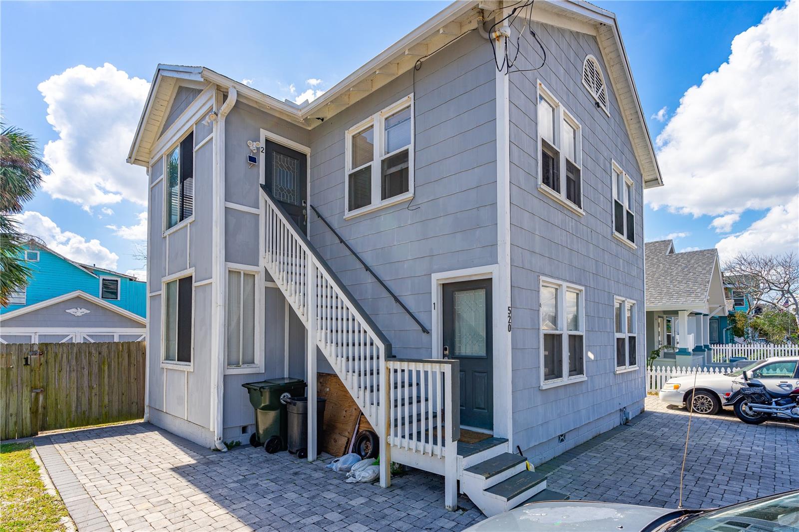 Charming duplex, steps from the World's Most Famous Beach! This duplex is the perfect opportunity to own a property only 9 houses away from the iconic Daytona Beach! Ideal for beach lovers or investors seeking rental income. This move-in-ready duplex features: Two separate units, each with 2 bedrooms, 1-bathroom, separate laundry, a fenced-in and very spacious backyard perfect for relaxation or entertaining, convenient trailer parking for added flexibility, prime location with close proximity to a beach access, variety of restaurants, shops, and local attractions! Move-in ready with fresh updates and well-maintained interiors! Enjoy the convenience of beach life and the charm of this well-cared-for property. Both units are occupied with great and reliable tenants!