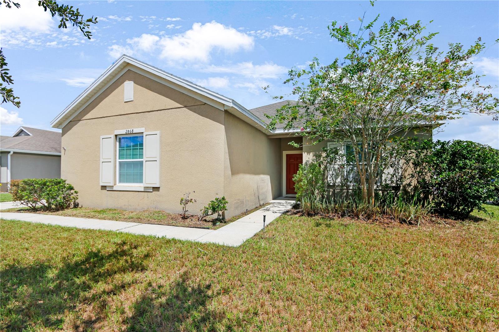 Welcome to this inviting 3 bedroom, 2 bath home in a desirable gated community in Kissimmee! The split floor plan offers both privacy and functionality, with a generously sized primary suite boasting 18 feet of depth and two large walk-in closets. Enjoy comfortable living with an interior laundry room, a side-entry garage, and a covered rear patio overlooking the fully fenced backyard. The community features a sparkling pool and playground, perfect for relaxation and recreation. The home has been priced attractively—making it a fantastic opportunity to add your own finishing touches and enjoy instant equity. Don’t miss your chance to own in this quiet neighborhood!