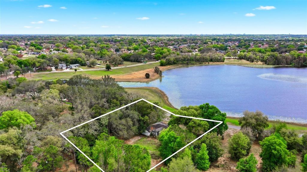 Photo of 8605 Lake Florence Boulevard, Orlando, FL 32818 (MLS # O6390354)