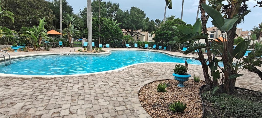Photo of 7220 Westpointe Boulevard #Apt 1429, Orlando, FL 32835 (MLS # O6454162)