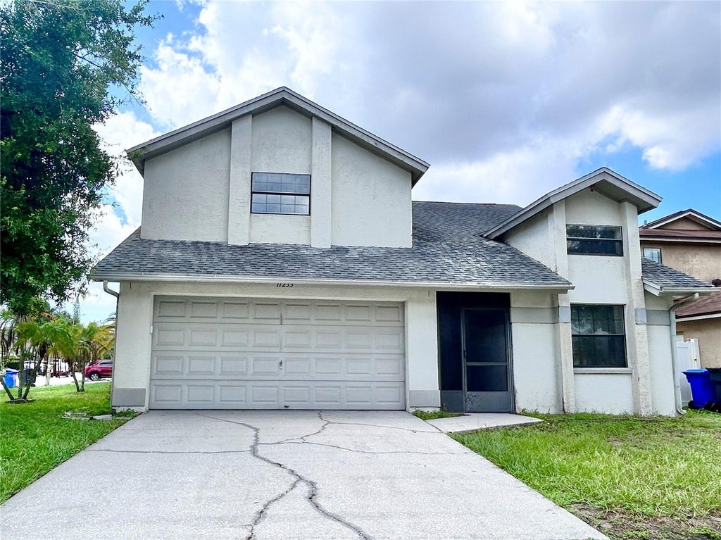 Photo of 11233 Elmfield Drive, Tampa, FL 33625 (MLS # TB8526143)