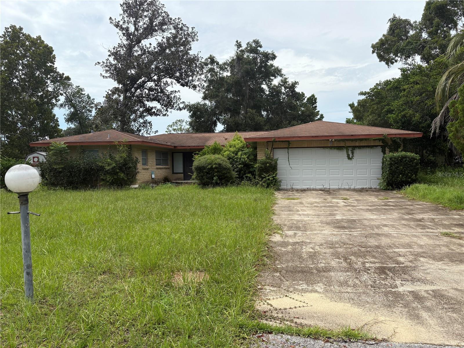 Investor Special — 2-bedroom, 2-bath home built in 1970, located on a quiet 0.25-acre lot in Silver Springs Shores. This property is being offered As-Is with no contingencies, inspections, or requests for repairs. Ideal for investors or buyers prepared to renovate and modernize. Don’t miss this opportunity to create instant equity in a quiet neighborhood.