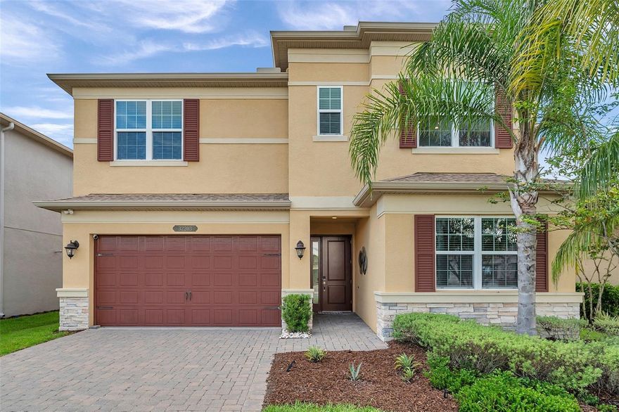 Welcome to the former MODEL HOME by GL HOMES— a beautifully appointed 3-bedroom, 3-bathroom home plus an OFFICE and a FLEX ROOM located in the highly desirable Winding Ridge community with NO CDD fees. Boasting an open split floor plan with nearly 2,600 sq ft of living space, this tastefully designed move-in ready home features a modern kitchen with quartz countertops and stainless steel appliances, a spacious primary suite with dual vanities and soaking tub, and a versatile bonus/flex room. The owners upgraded the NEW TILE throughout the first floor and renovated the bathroom to the luxury spa like escapes. All light fixtures in the house have been upgraded as well. The outside area is extremely private on the oversized lot backing to the wood preserves. Indulge in LUXURY at the Resort-Style Clubhouse, where every detail enhances your lifestyle. Outdoor amenities feature a covered patio overlooking the pool, a wet play activity center, Pickleball and Tennis courts, a full basketball court, a shaded playground, an open playfield, and a party pavilion. Indoors, discover a social hall, catering kitchen, indoor sports complex, game room, and a multi-purpose room for fitness classes, all complemented by a fully equipped fitness center. Enhancing your experience is a Full-Time Party Coordinator who organizes club activities and events. The Winding Ridge community offers a GATED, maintenance-free lifestyle with the HOA FEE covering LAWN MAINTENANCE, landscape maintenance, fertilization, mulching, and exterior pest control. Your new home is conveniently located just minutes from Wesley Chapel’s Top-Rated Schools, near I75 on SR56, Wire-Grass Mall, Tampa Premium Outlets, Hospitals, Restaurants, and more. This is your gateway to a vibrant and convenient lifestyle. With over $80,000 in UPGRADES, this home is a true stunner. Come to see it today! The application fee is $45