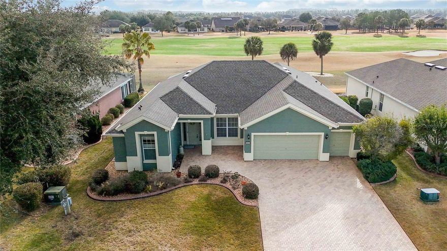 Kingston Model with Golf Course Views in Stone Creek 55+ Community

Welcome to this beautifully maintained 3-bedroom, 2-bath Kingston model located on a premium golf course lot in the highly sought-after Stone Creek 55+ community. Offering 2,413 square feet of well-designed living space, this home delivers the ideal blend of comfort, functionality, and Florida lifestyle living.

Curb appeal impresses immediately with a large paver driveway, inviting front porch, and 3-car garage with dedicated golf cart parking. Inside, abundant natural light enhances the open layout, while major updates provide peace of mind, including a new roof (2022) and A/C replacement (2018).

The heart of the home is the bright, open kitchen featuring Corian countertops, stylish backsplash, cabinet pull-outs, and newer stainless steel appliances, all included. Enjoy casual dining in the eat-in kitchen or host gatherings in the formal dining room.

The spacious primary suite serves as a private retreat, complete with a custom walk-in closet, dual sinks, walk-in shower, and soaking tub. Two additional bedrooms offer flexibility, with one currently ideal as a home office or craft room.

Relax and take in golf course views from the tiled, enclosed sunroom or the expansive screened lanai, perfect for morning coffee, entertaining, or sunset evenings.

Residents of Stone Creek enjoy an exceptional array of resort-style amenities, including pickleball, fitness center, swimming, social clubs, public golf, and more—supporting an active, connected lifestyle.

This move-in-ready home offers outstanding value in one of the area’s premier 55+ communities. Schedule your private showing today.